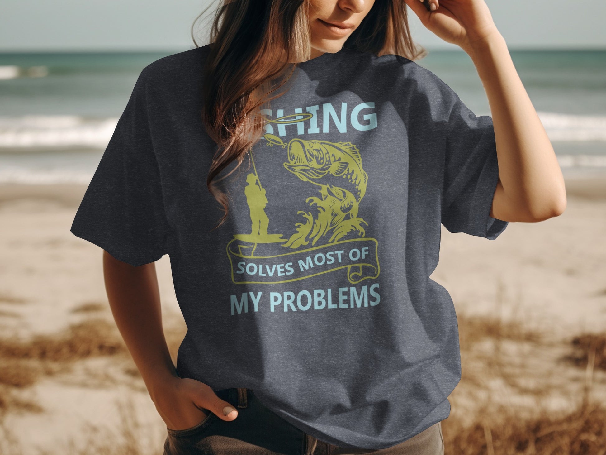 Dark grey t-shirt with yellow text: "FISHING SOLVES MOST OF MY PROBLEMS"