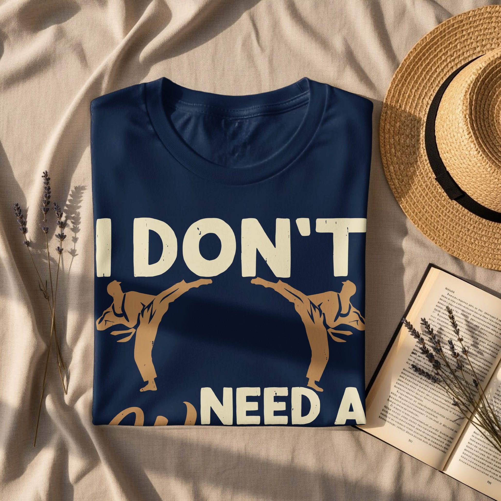 Navy t-shirt with "I DON'T NEED A" and martial arts figures.