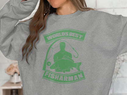 Grey sweatshirt with "WORLD'S BEST FISHARMAN" text and fish graphic.