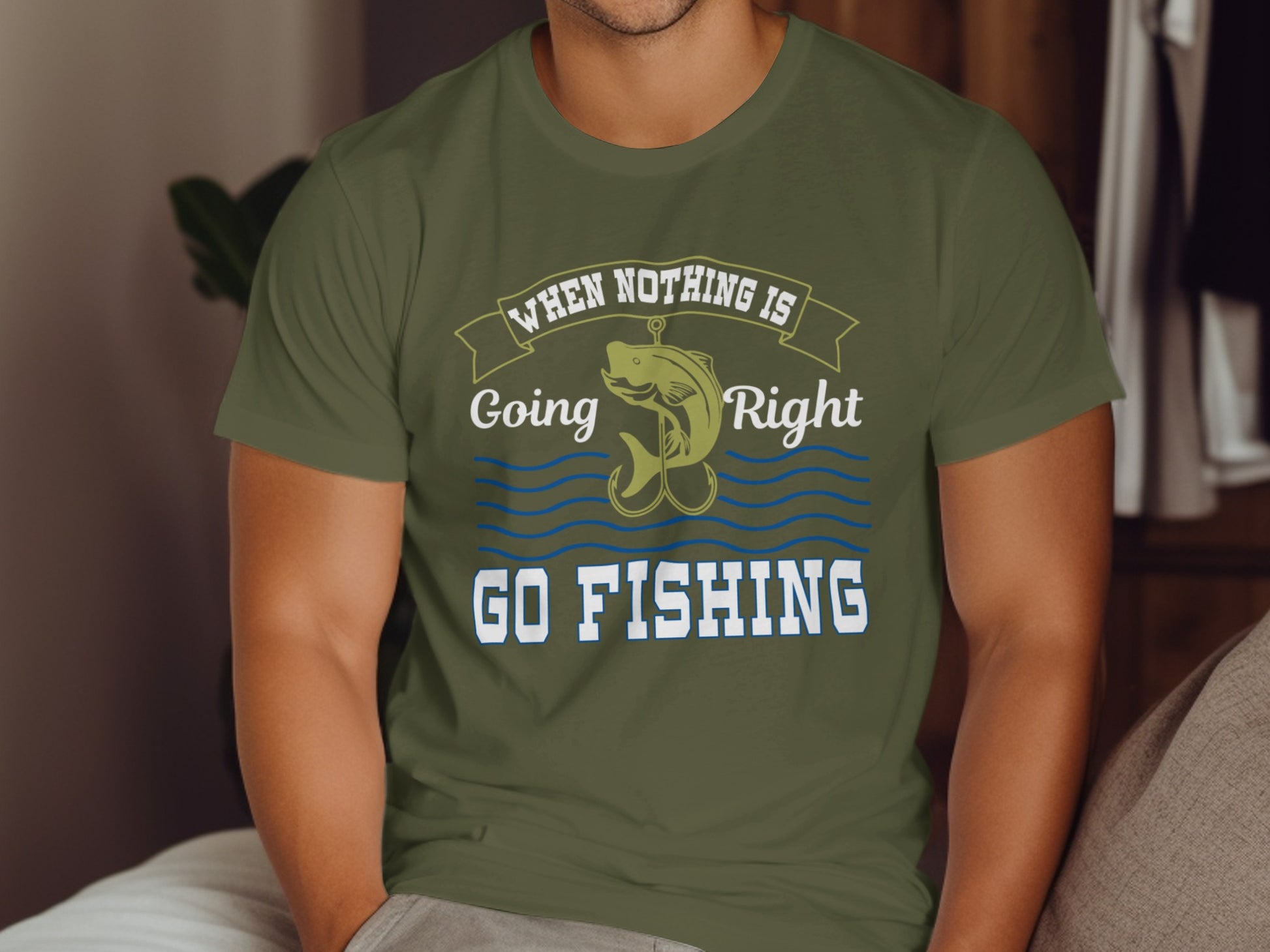 Green t-shirt with "When Nothing is Going Right, Go Fishing" and a fish graphic.
