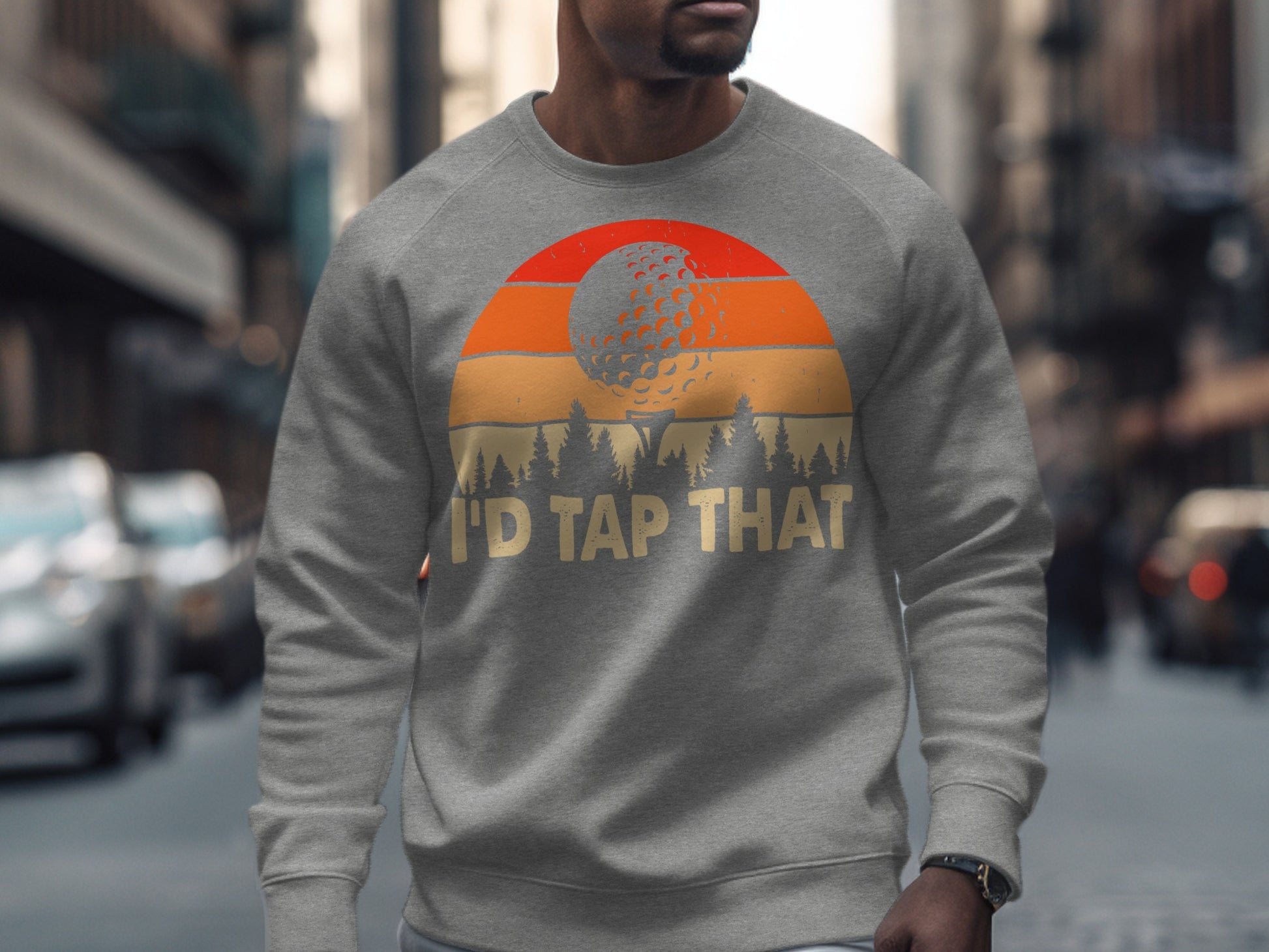 Gray sweatshirt with "I'D TAP THAT" and golf ball sunset graphic.