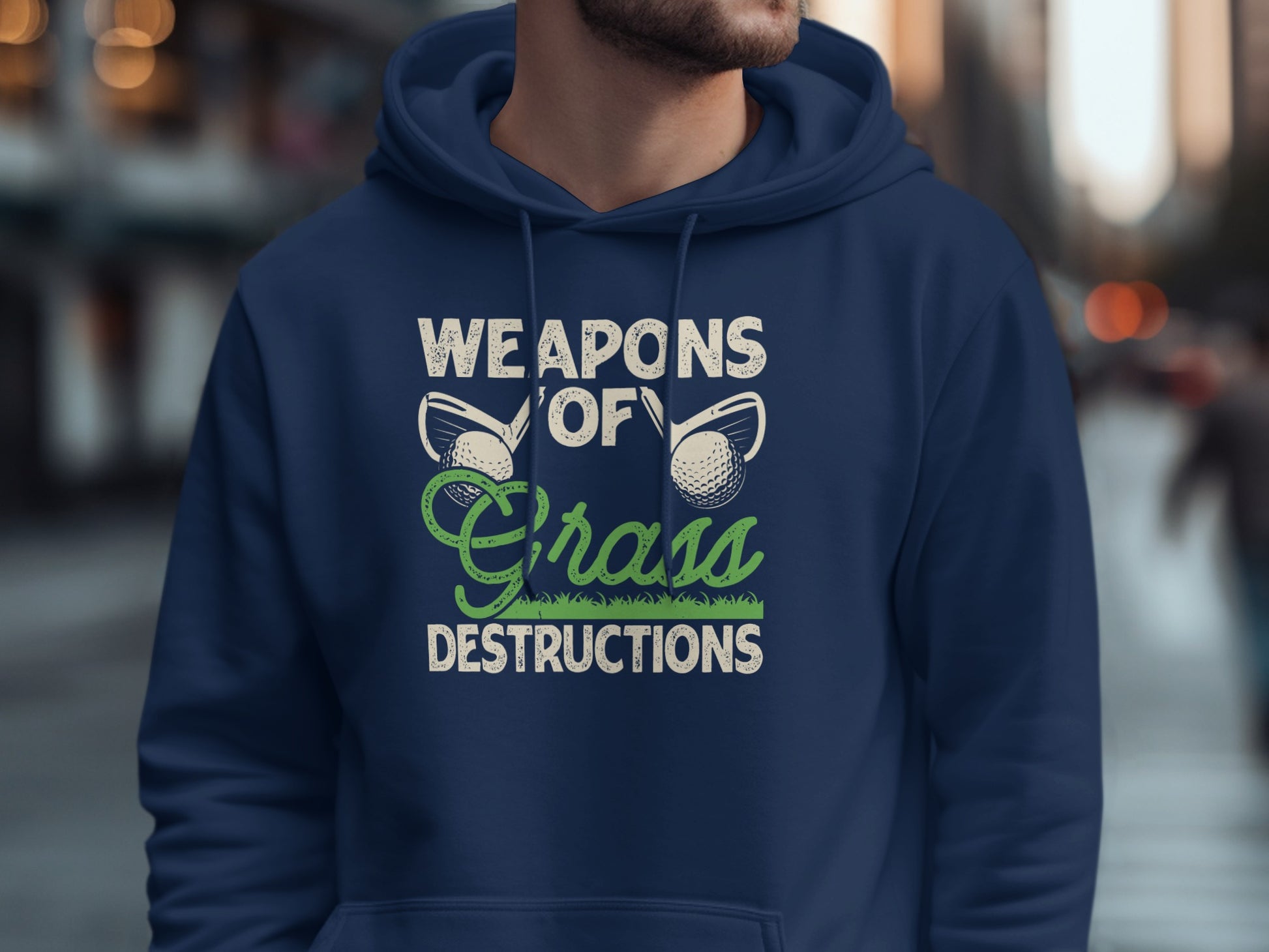 Navy hoodie with "WEAPONS OF Grass DESTRUCTIONS" and golf club graphic.