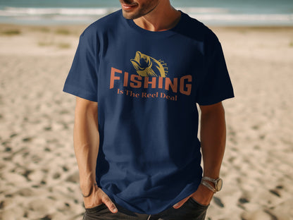 Navy t-shirt with "Fishing Is The Reel Deal" text and a jumping fish graphic.