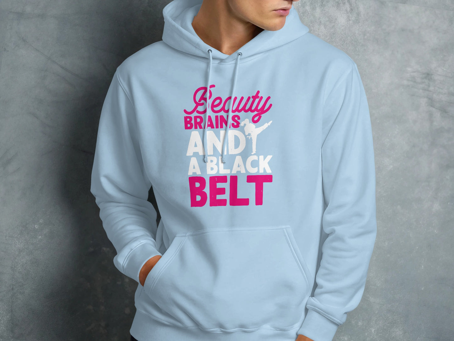 Light blue hoodie with "Beauty, Brains, AND A BLACK BELT" text.