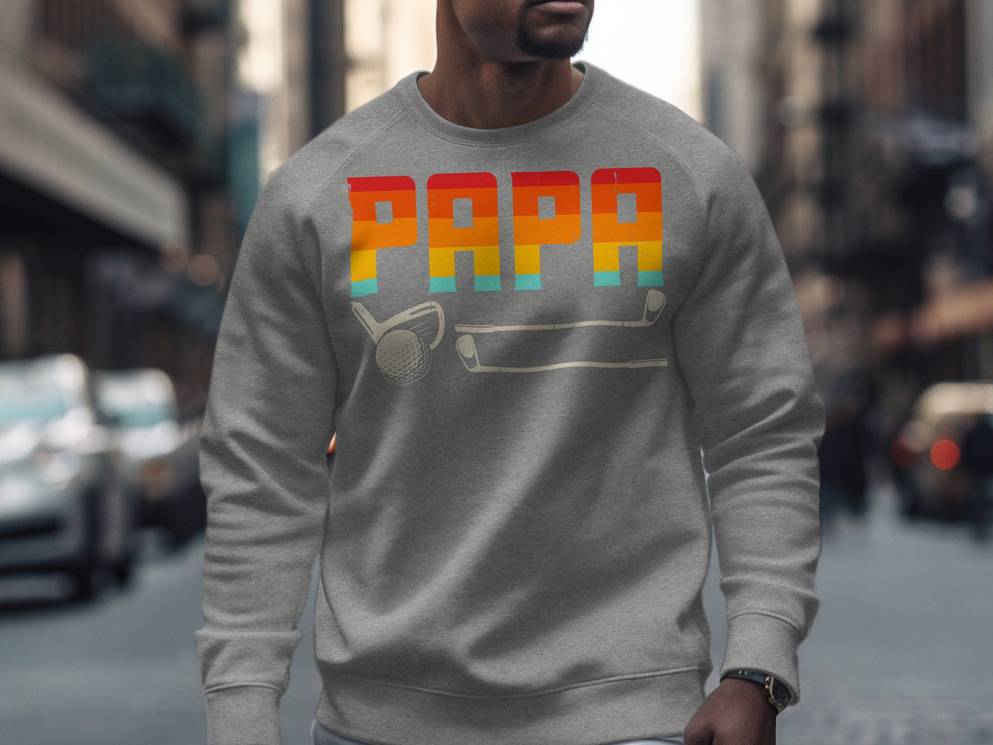 Grey sweatshirt with "PAPA" in colorful stripes and golf club graphic.