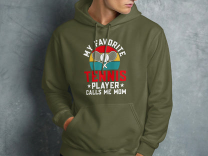 Olive green hoodie with "My Favorite Tennis Player Calls Me Mom" text and tennis rackets.