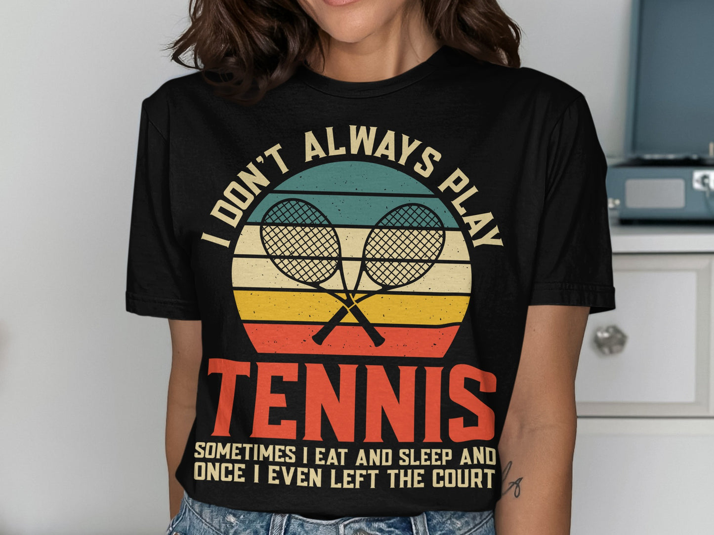 T-shirt with retro tennis rackets and text "I DON'T ALWAYS PLAY TENNIS".
