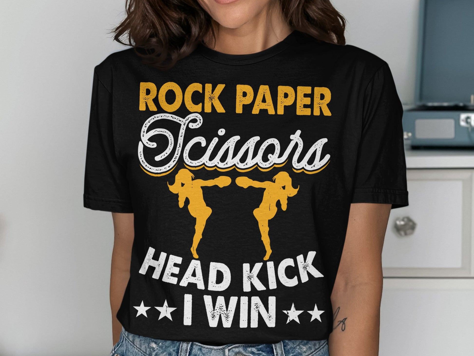 T-shirt with "Rock Paper Scissors Head Kick I Win" and two figures playing.