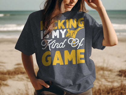 Dark t-shirt with yellow text "KICKING IS MY Kind Of GAME".