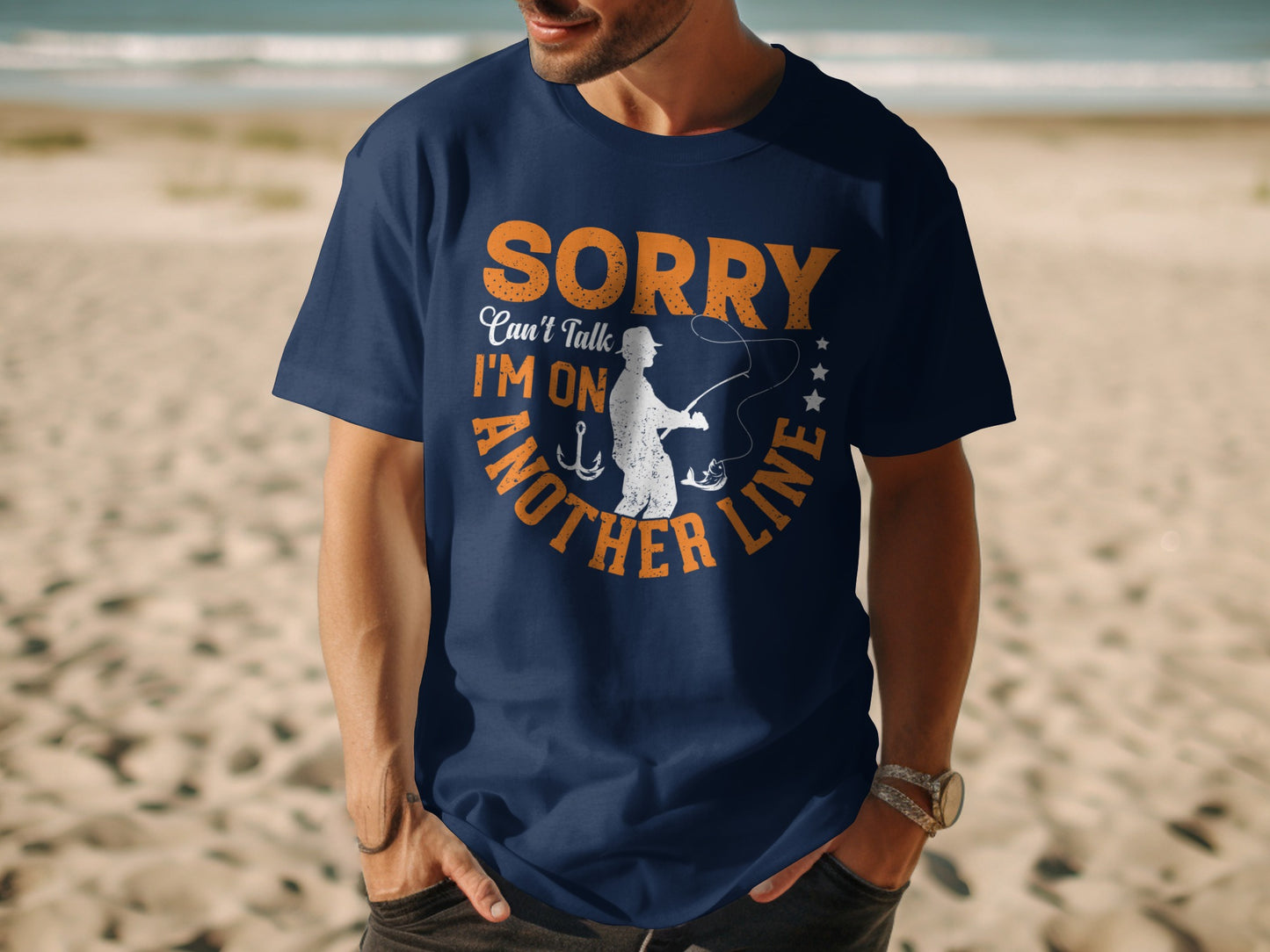 Navy t-shirt with "SORRY Can't Talk I'm On Another Line" and fishing graphic.