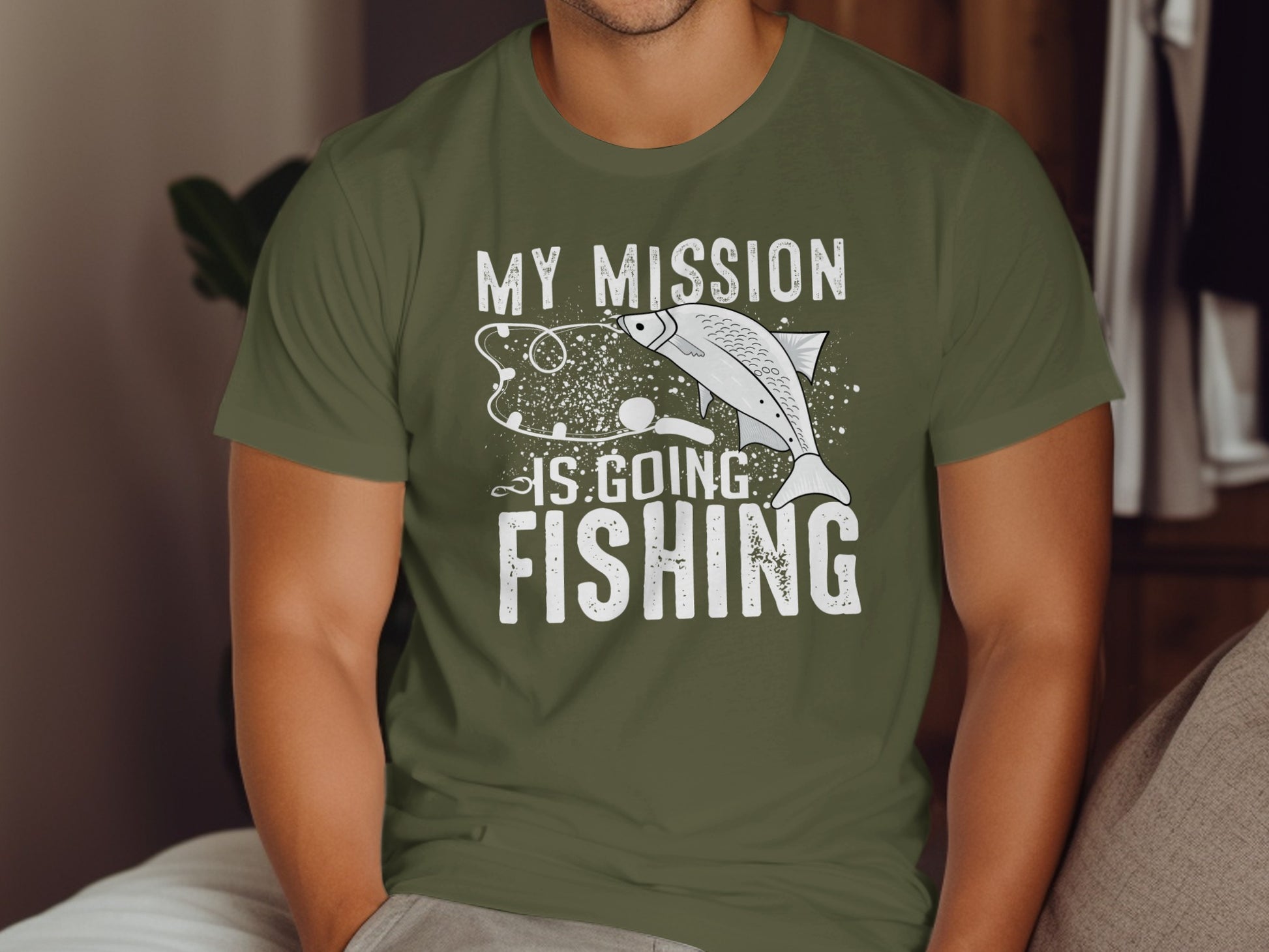 Green t-shirt with "MY MISSION IS GOING FISHING" and fish graphic.