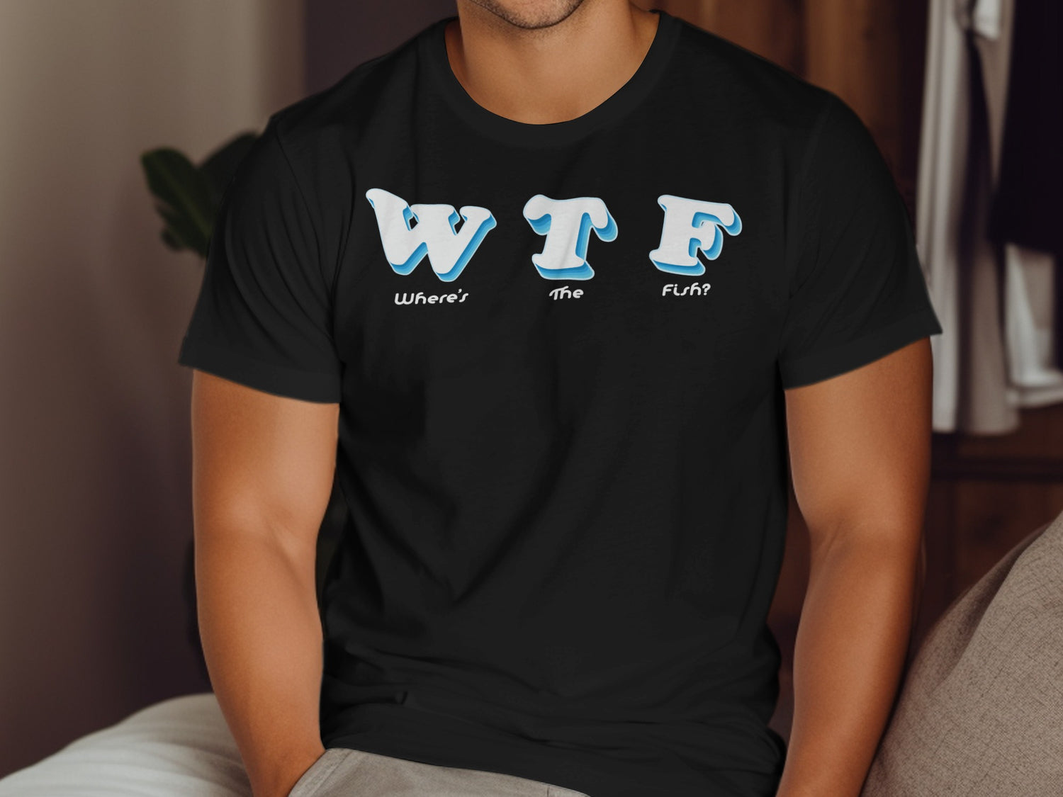Black t-shirt with "WTF Where's The Fish?" text.