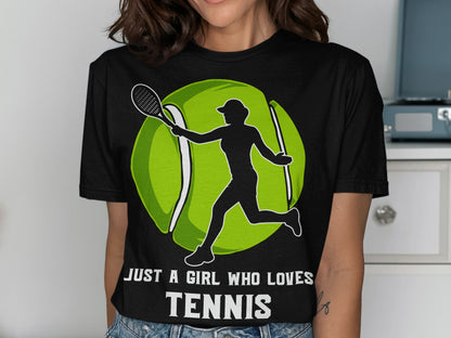 Black t-shirt with white silhouette of a girl playing tennis and large green tennis ball.