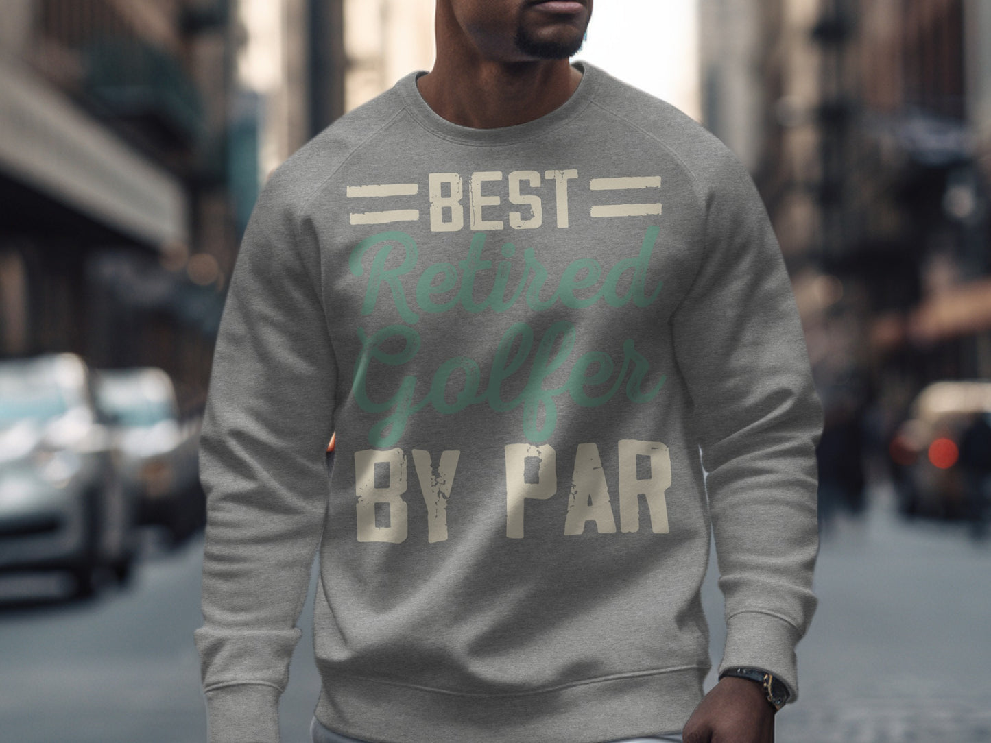 Gray sweatshirt with "BEST RETIRED GOLFER BY PAR" text.
