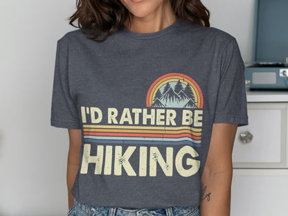 T-shirt with "I'D RATHER BE HIKING" text and mountain graphic.