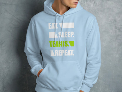 Light blue hoodie with "Eat. Sleep. Tennis. Repeat." text.