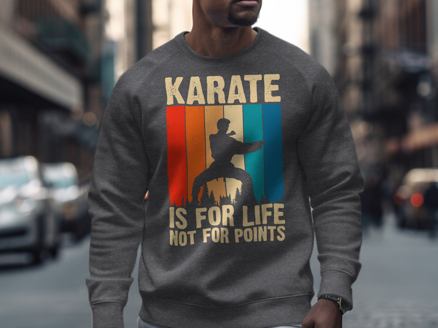 Retro sunset graphic with "Karate is for life not for points" text on sweatshirt.