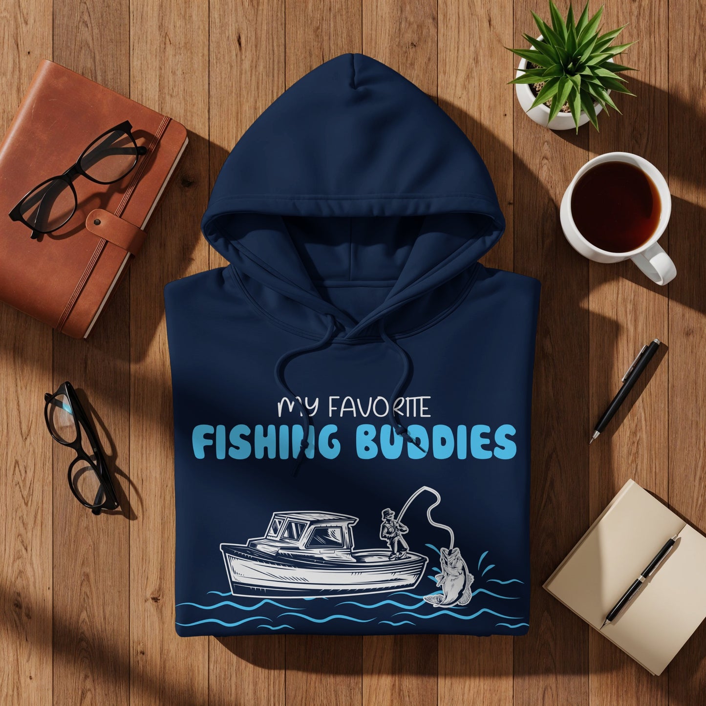 Navy hoodie with "MY FAVORITE FISHING BUDDIES" text and boat graphic.