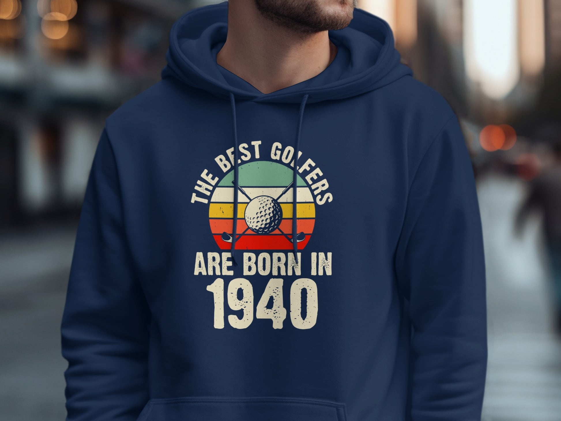 Navy hoodie with "The best golfers are born in 1940" text and golf design.