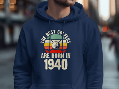 Navy hoodie with "The best golfers are born in 1940" text and golf design.