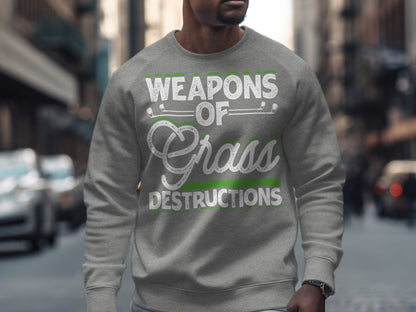 Gray crewneck sweatshirt with "WEAPONS OF GRASS DESTRUCTIONS" text.