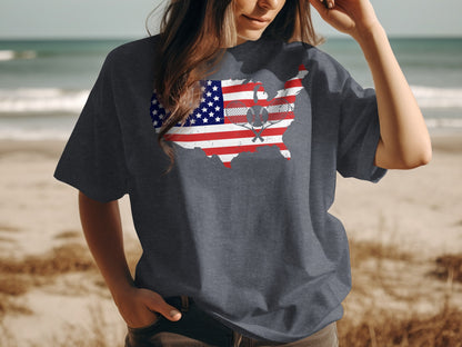 T-shirt with US flag map graphic featuring crossed oars on a beach background.