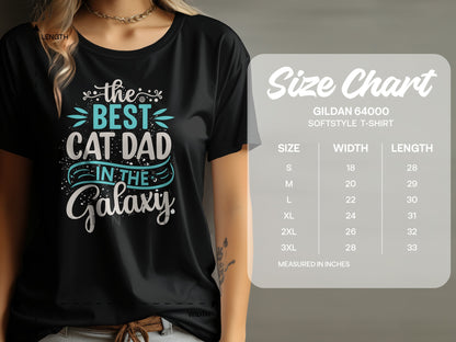 Black t-shirt with "The Best Cat Dad In The Galaxy" text and a size chart.