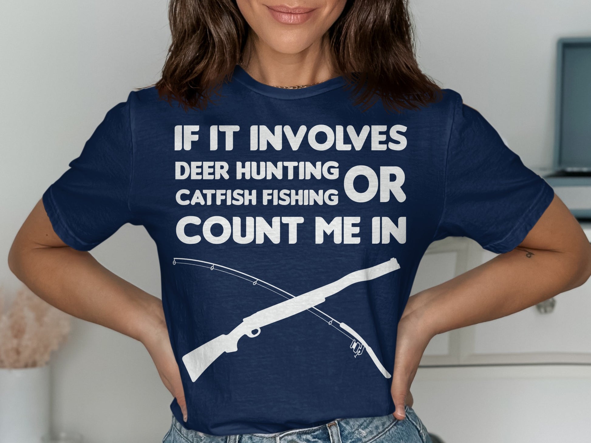 Navy t-shirt with "IF IT INVOLVES DEER HUNTING OR CATFISH FISHING COUNT ME IN".