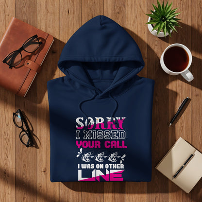 Navy hoodie with "Sorry I missed your call, I was on the other line" fishing graphic.
