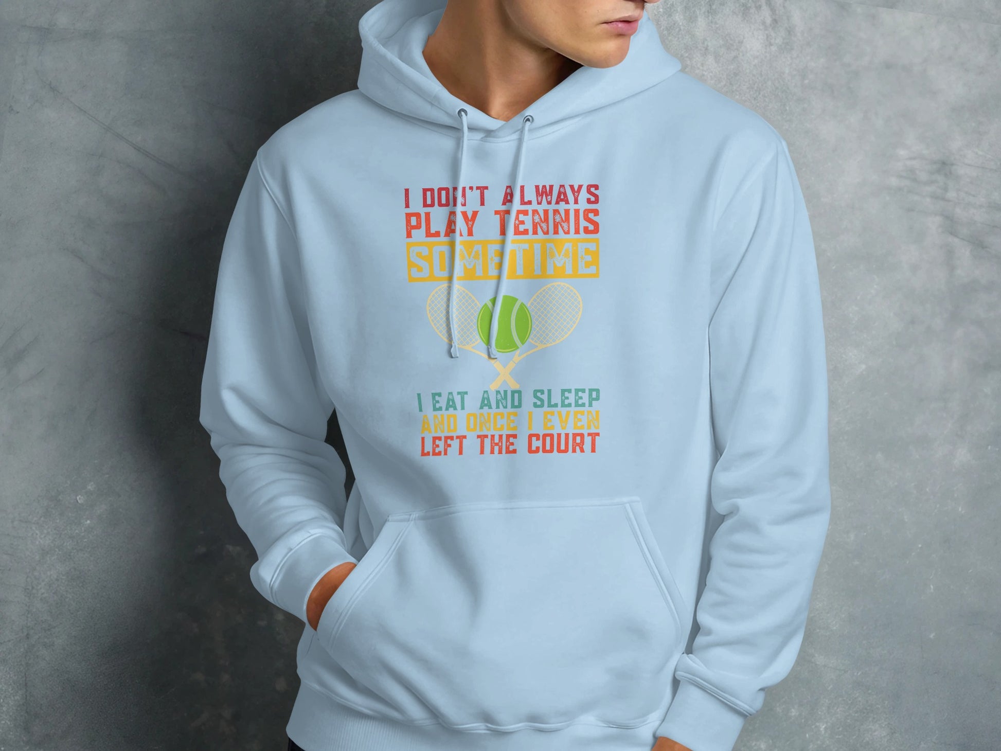 Light blue hoodie with tennis graphic and "I don't always play tennis" text.