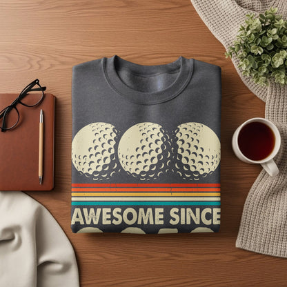 Gray sweatshirt with three textured golf balls and "Awesome Since" text.