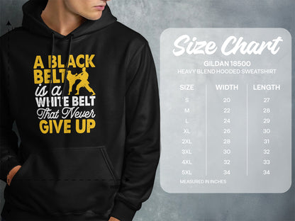 Hooded sweatshirt with "A black belt is a white belt that never give up" graphic and size chart.