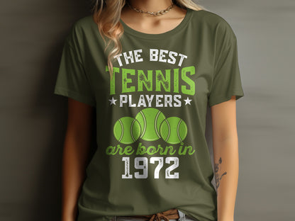 Green t-shirt with "The Best Tennis Players Are Born in 1972" text and tennis balls.