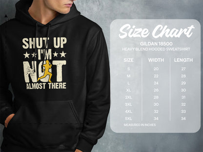 Hoodie with "Shut Up, I'm Not Almost There" text and size chart.