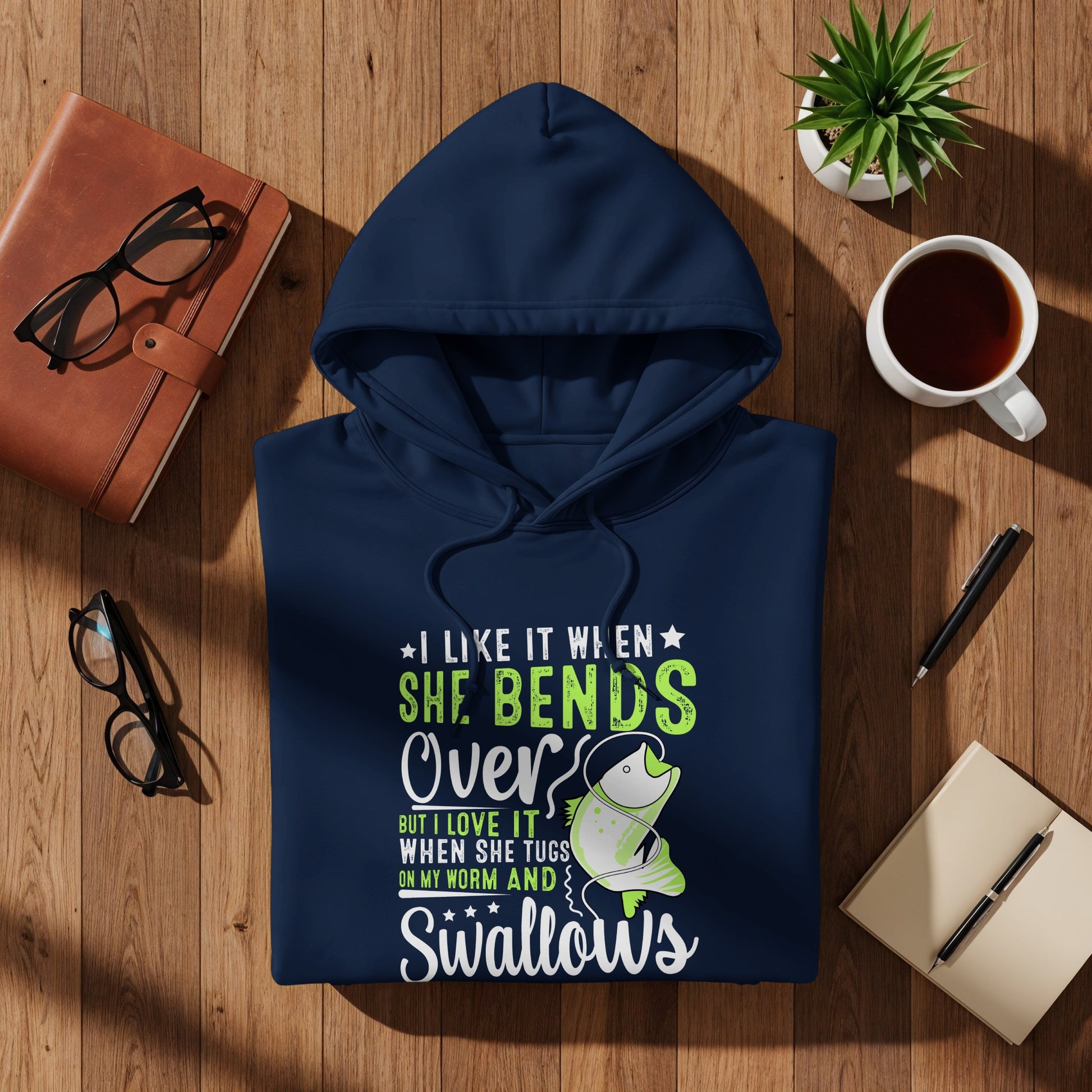 Navy hoodie with "I like it when she bends over" fishing graphic.