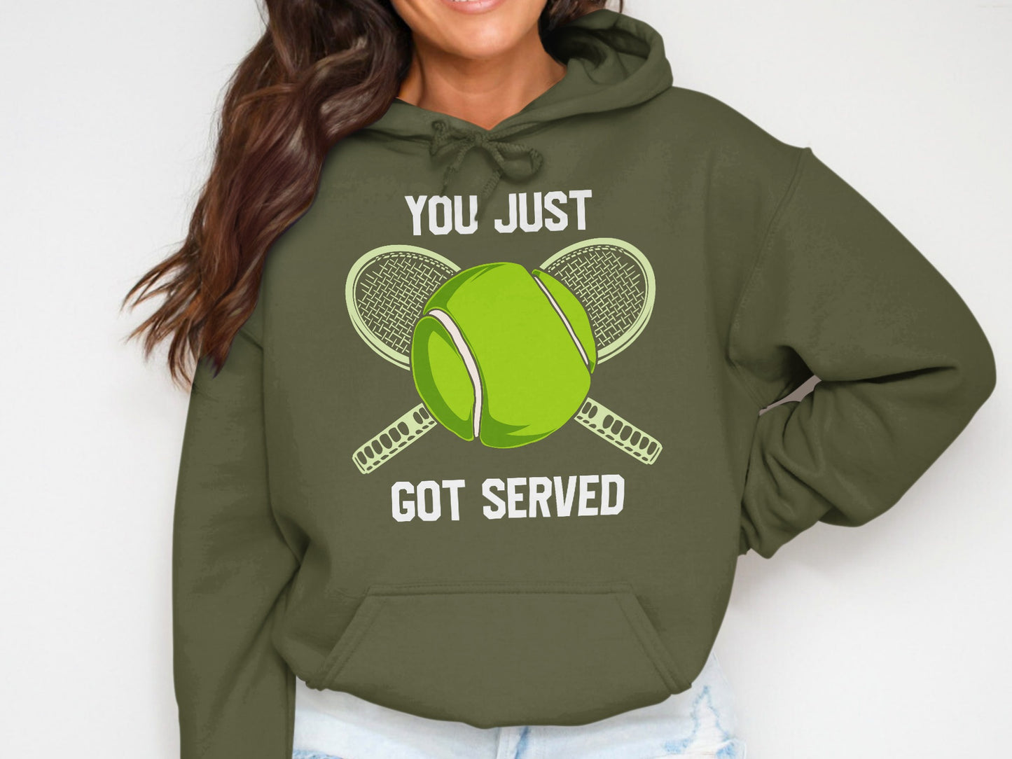 Olive green hoodie with tennis ball and rackets, text "YOU JUST GOT SERVED".