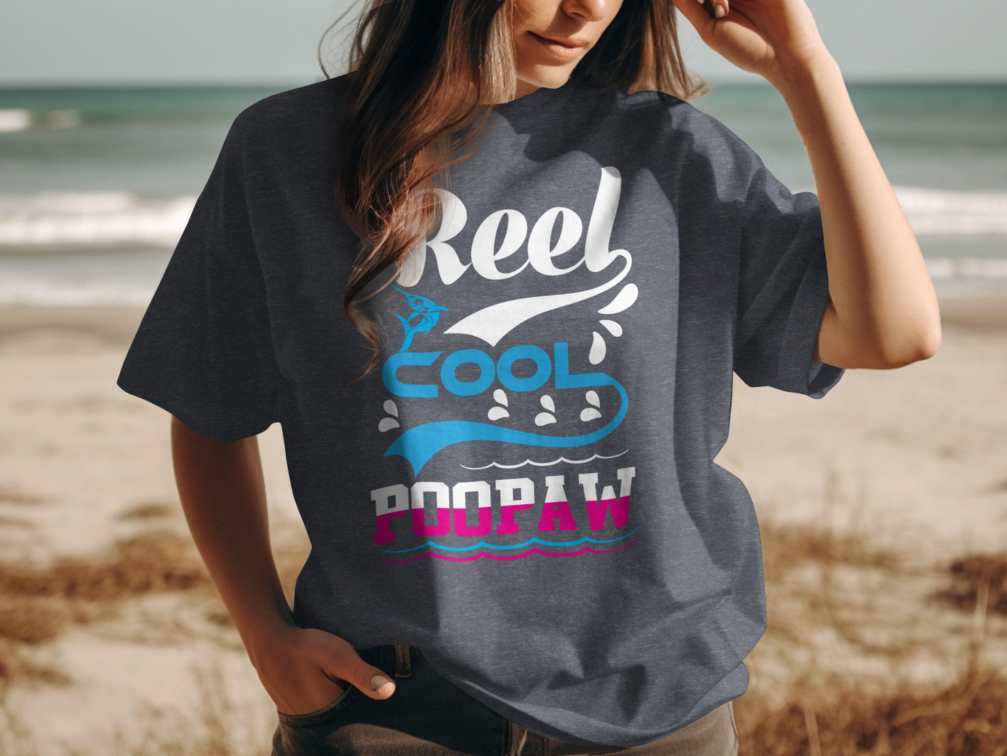 Dark grey t-shirt with "Reel Cool Doughnut" graphic and ocean waves.