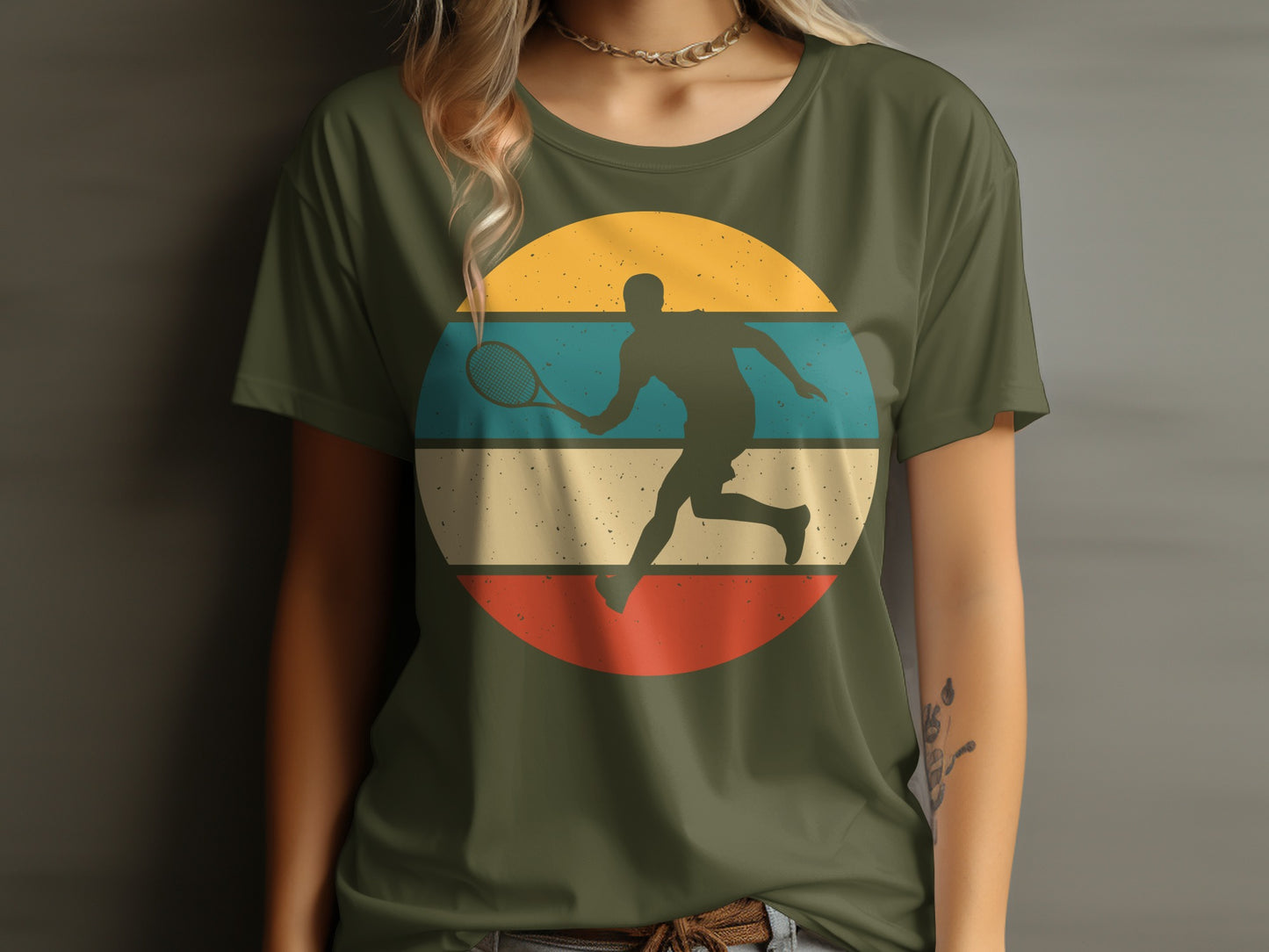Retro tennis player silhouette within a striped circle on a green t-shirt.