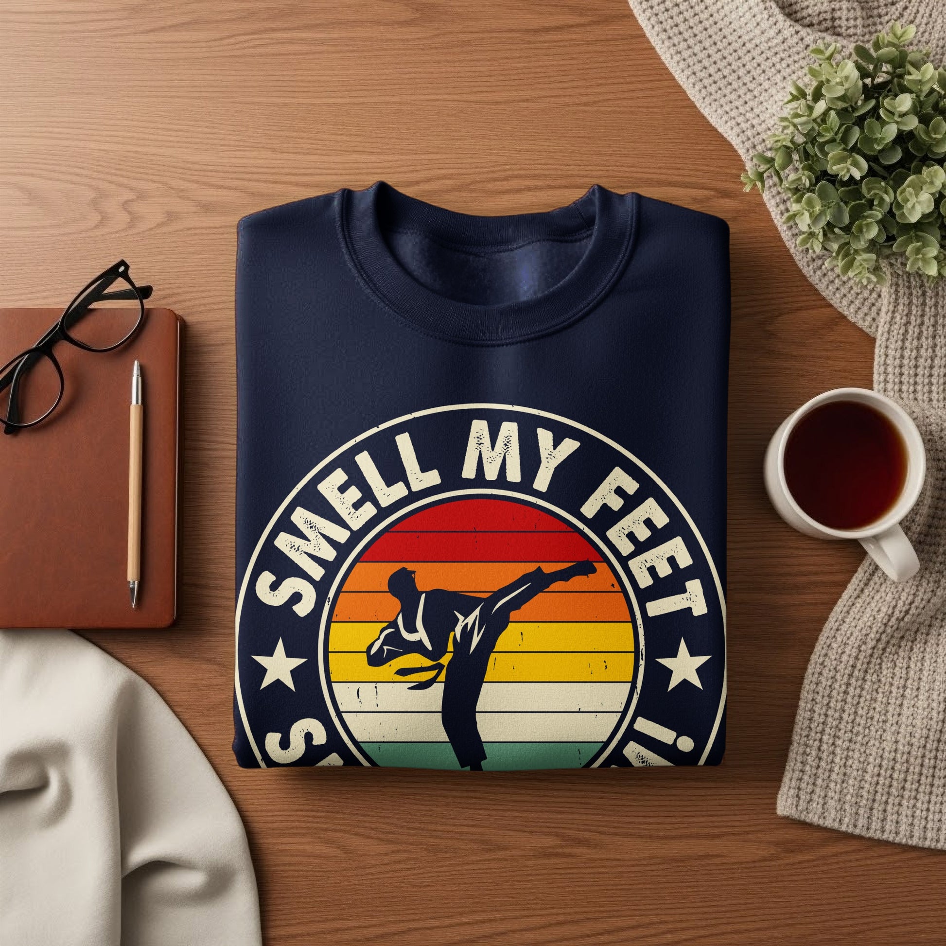 Navy sweatshirt with graphic that says "Smell My Feet!" featuring a martial artist.