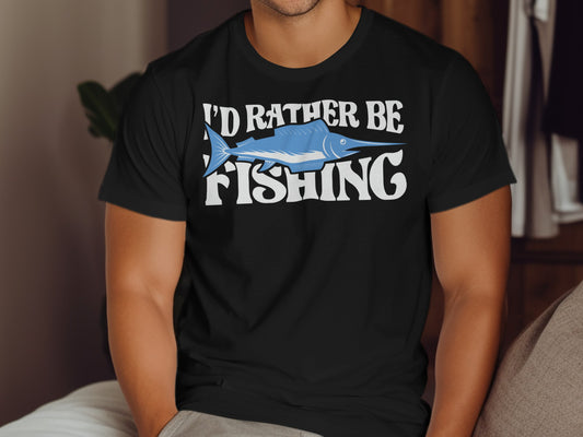 Black t-shirt with blue marlin and text "I'd rather be fishing".