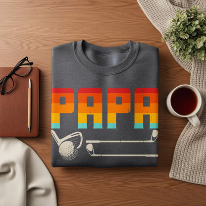 Dark gray sweatshirt with "PAPA" in rainbow stripes and golf club graphics.