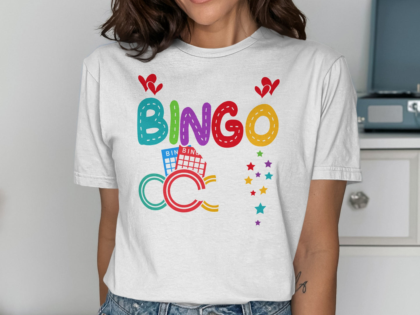White t-shirt with colorful "BINGO" text and graphics.