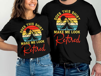 Couple wearing matching t-shirts with mountain sunset graphic and "Retired" text.