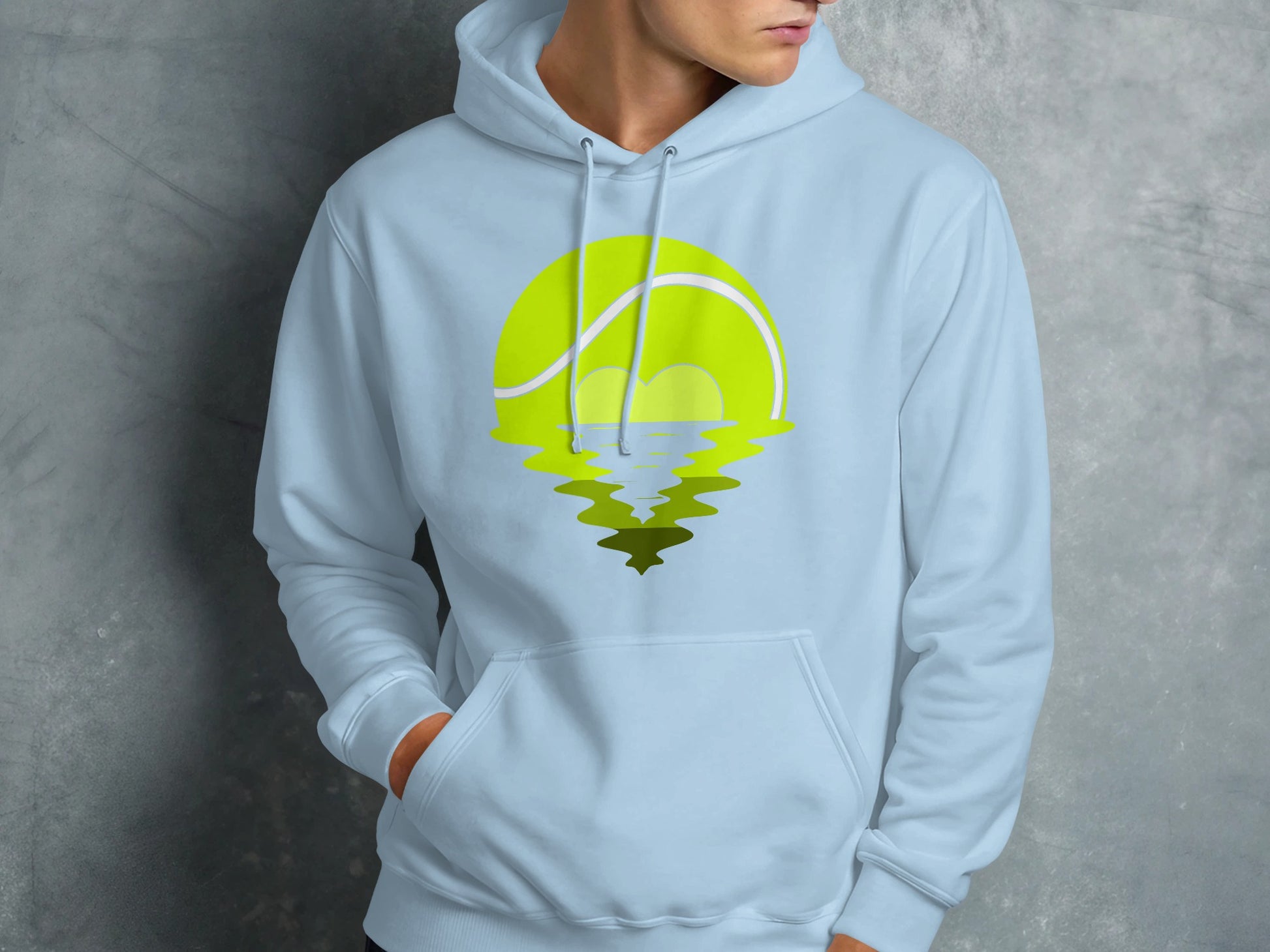 Light blue hoodie with a tennis ball reflected in water graphic.