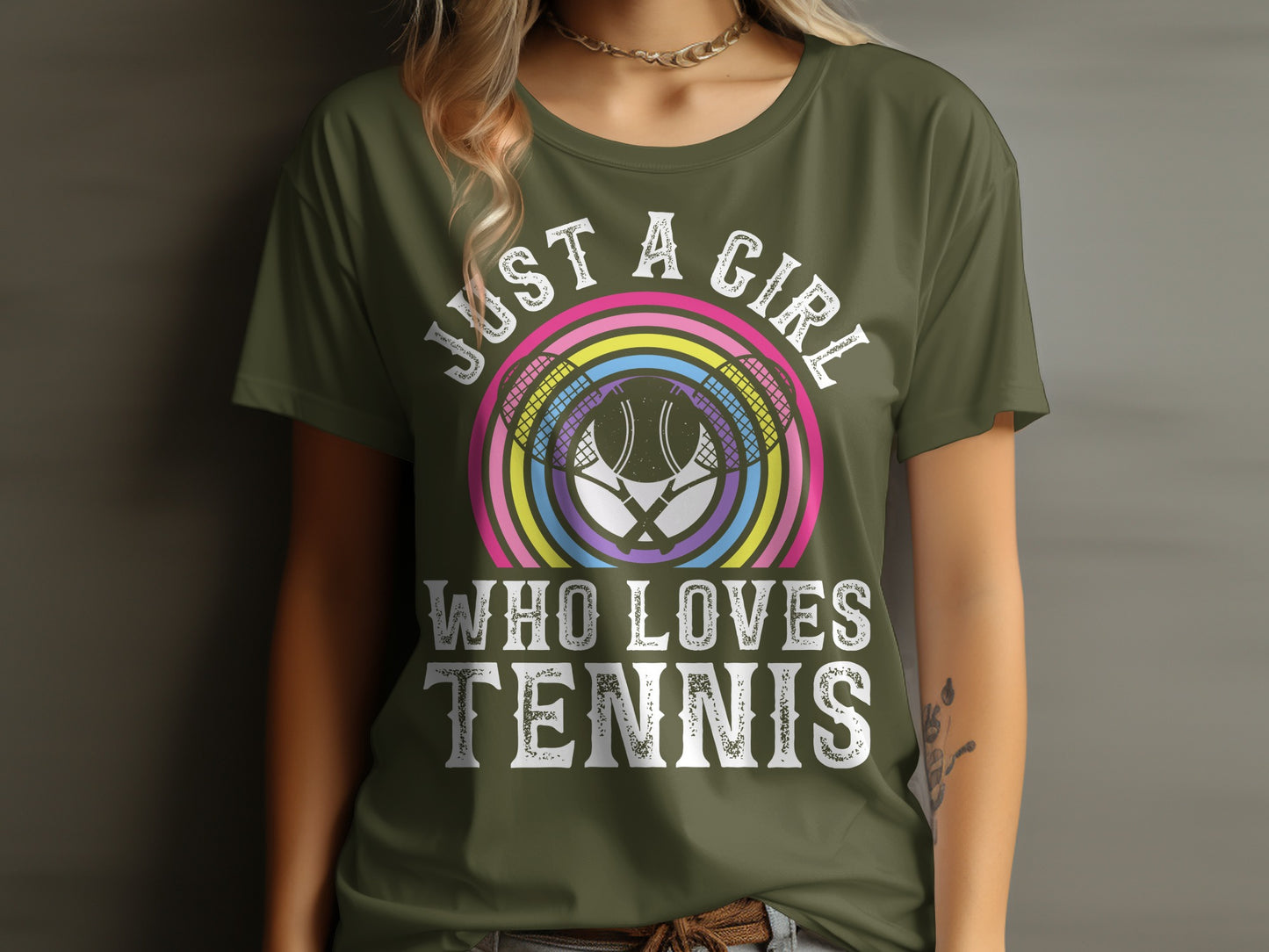 Olive green t-shirt with "JUST A GIRL WHO LOVES TENNIS" and rainbow tennis graphics.