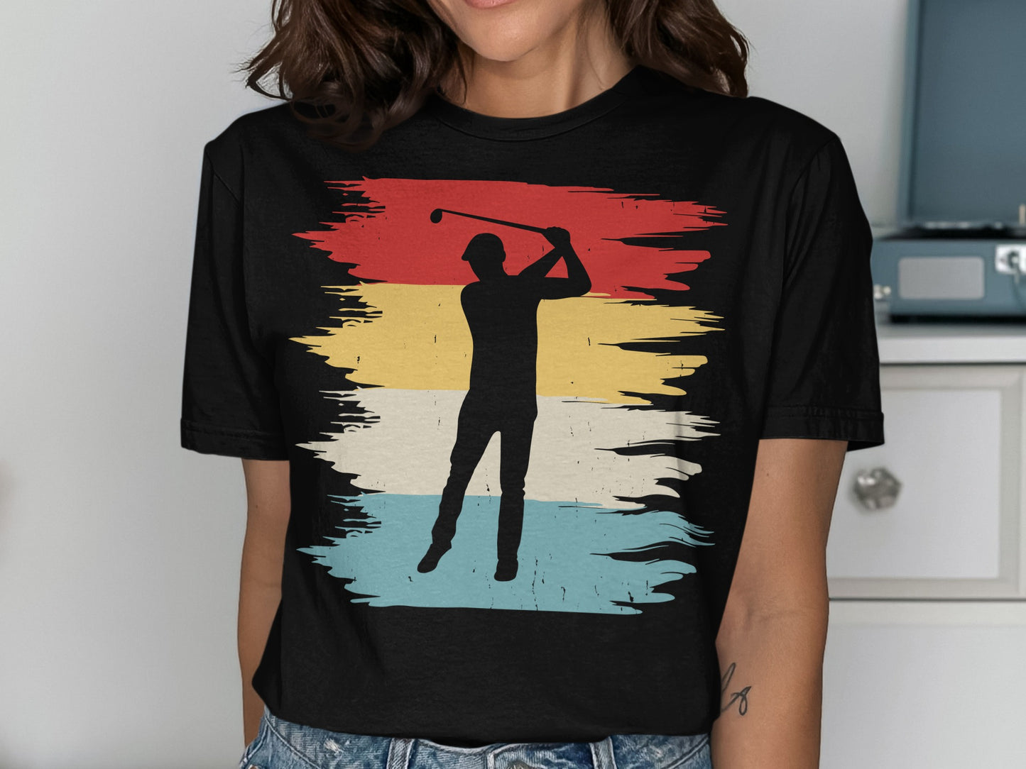 Silhouette of a golfer swinging against a distressed background of red, yellow, and blue stripes.