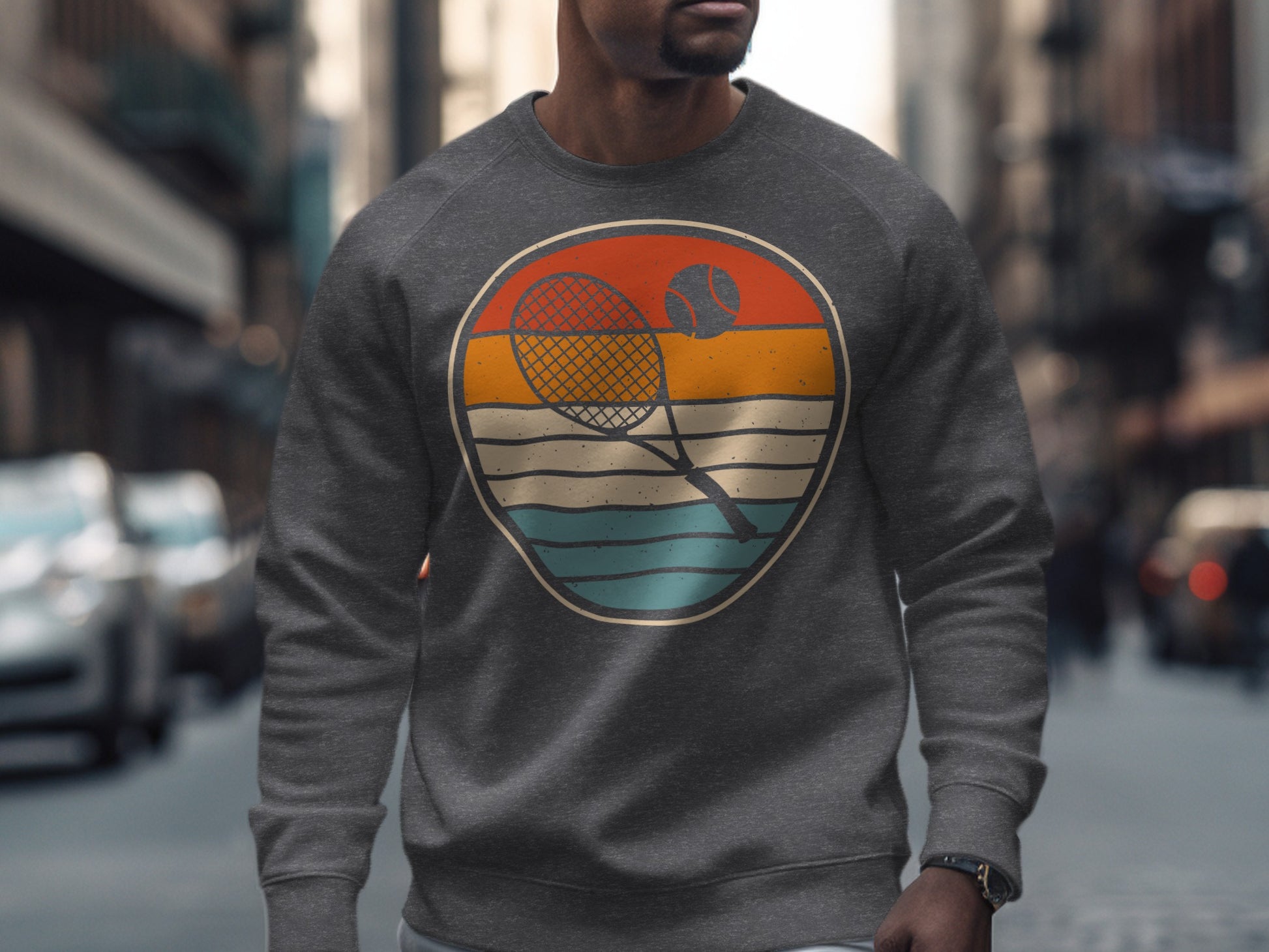 Gray crewneck sweatshirt with a circular retro tennis graphic.