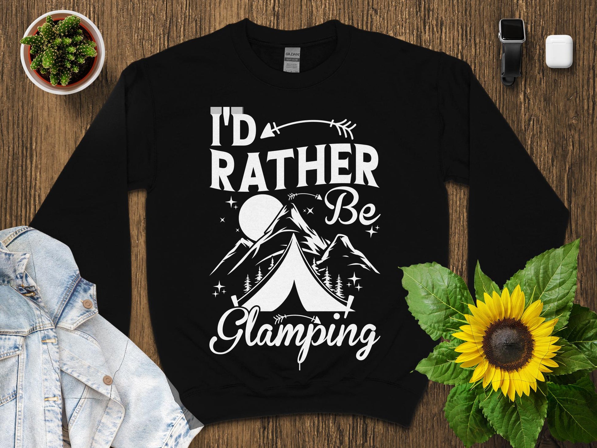 Black sweatshirt with "I'd Rather Be Glamping" and mountain tent graphic.