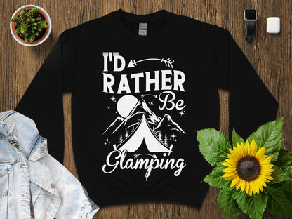 Black sweatshirt with "I'd Rather Be Glamping" and mountain tent graphic.