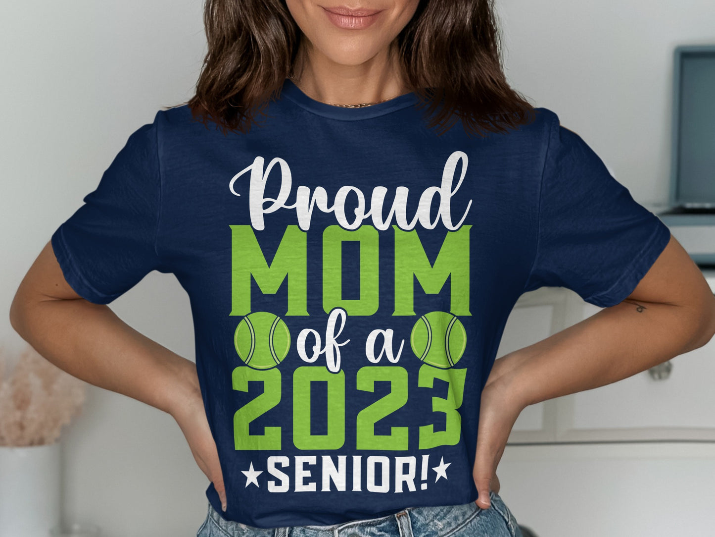 Navy t-shirt with "Proud Mom of a Senior 2023" text and tennis balls.